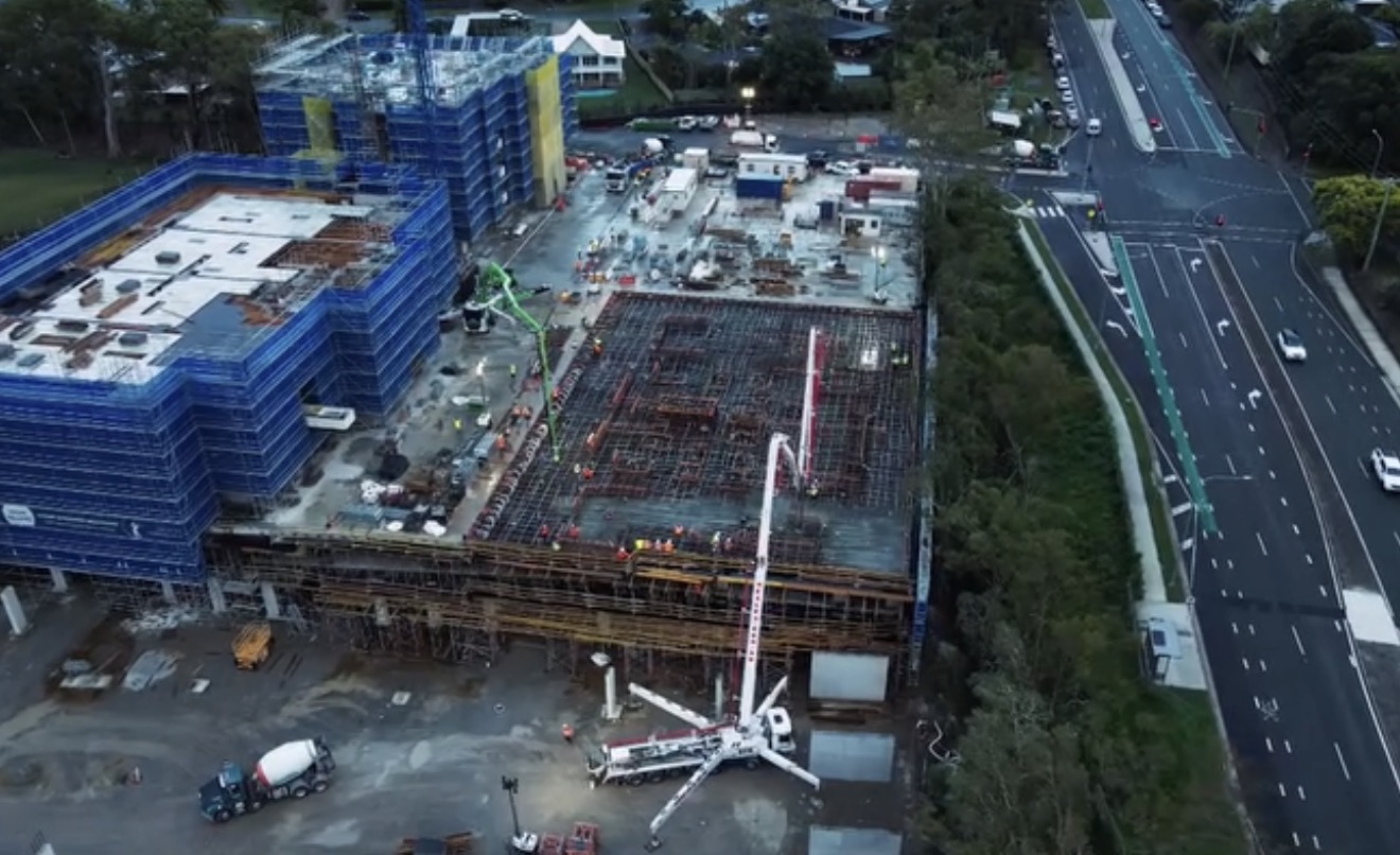 Aerial view of commercial concrete pour with Pumpcon boom