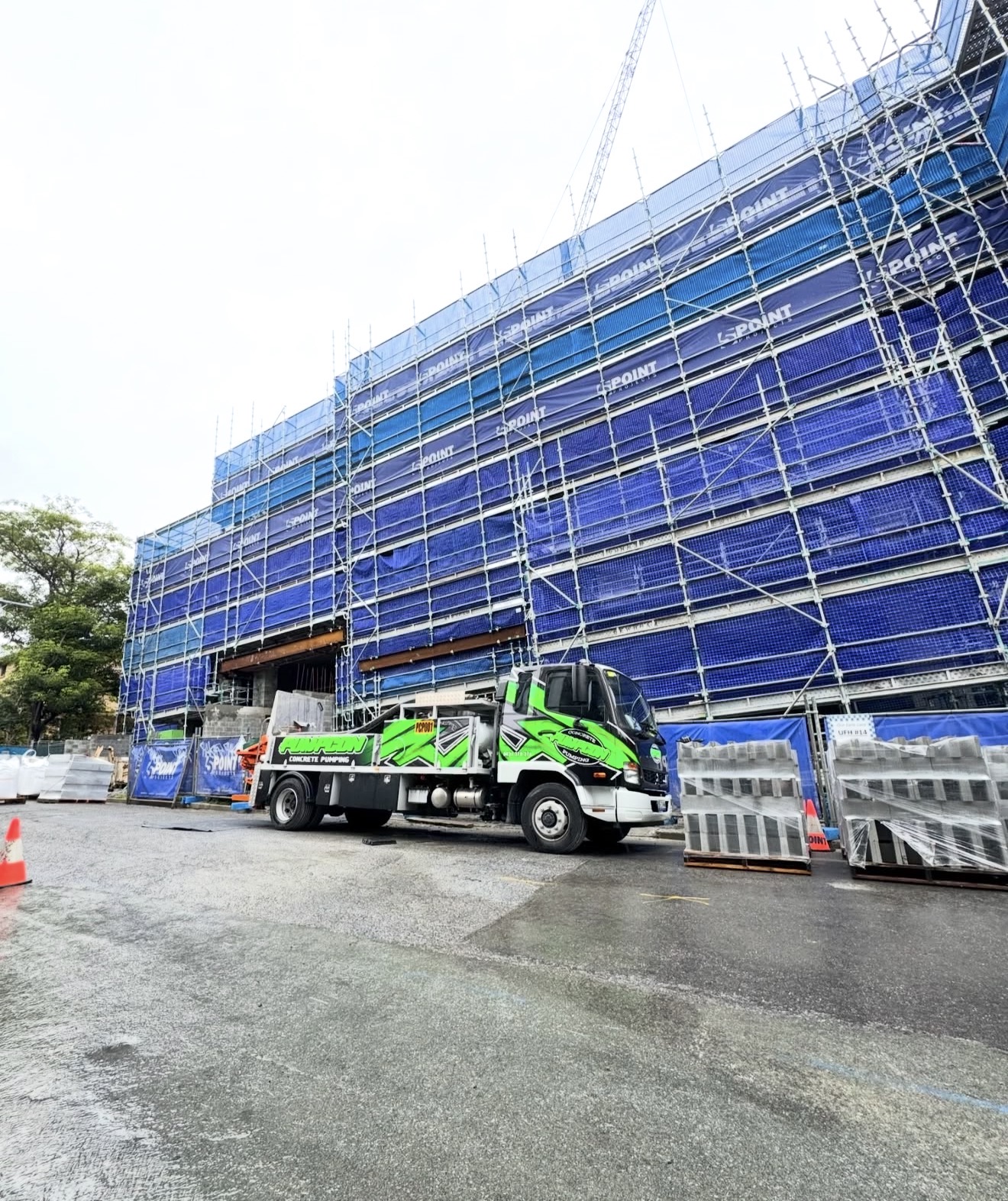 Pumpcon line pump truck at multi-storey construction site
